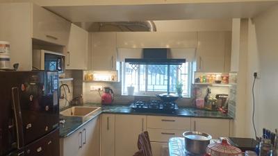 Kitchen Image of 865 Sq.ft 2 BHK Apartment / Flat for sale in Baghajatin Kolkata for Rs. 4750000