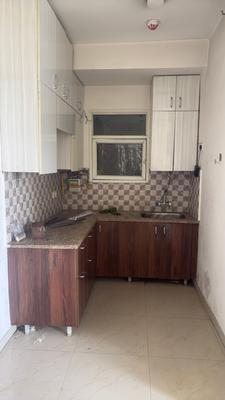 Kitchen Image of 760 Sq.ft 2 BHK Apartment / Flat for sale in Mahagun Mantra, Noida Extension Greater Noida for Rs. 6500000