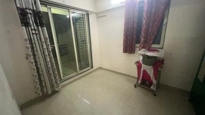 Bedroom Image of 660 Sq.ft 1 BHK Apartment / Flat for rent in Mohan Willows, Badlapur East Badlapur for Rs. 8500