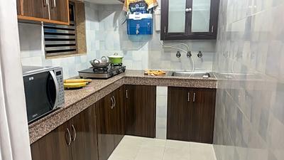 Kitchen Image of 600 Sq.ft 1 BHK Builder Floor for rent in Palam Vihar Gurgaon for Rs. 23000