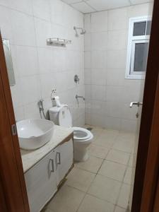 Bathroom Image of 990 Sq.ft 2 BHK Apartment / Flat for sale in Bhartiya Nikoo Homes Phase 2, Thanisandra Bengaluru for Rs. 13500000