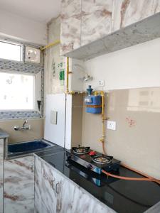 Kitchen Image of 550 Sq.ft 1 BHK Apartment / Flat for rent in Vikram Golf View Condos, Sector 19 Dwarka New Delhi for Rs. 25000