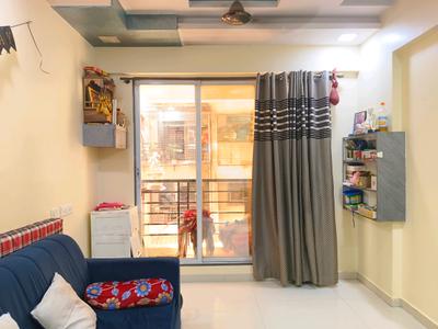 Living Room Image of 615 Sq.ft 1 BHK Apartment / Flat for sale in Thakurli Thane for Rs. 4700000