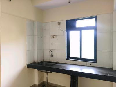 Kitchen Image of 700 Sq.ft 1 BHK Apartment / Flat for sale in Kalyan West Kalyan for Rs. 5800000