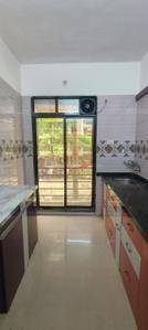 Kitchen Image of 595 Sq.ft 1 BHK Apartment / Flat for sale in Shree Chamunda Garden, Thakurli Thane for Rs. 4450000