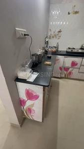 Kitchen Image of 990 Sq.ft 1 BHK Apartment / Flat for rent in LK Vrundavan Residency II, Sargasan Gandhinagar for Rs. 18500