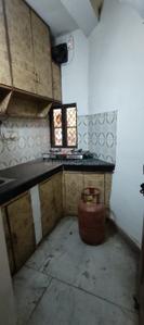 Kitchen Image of 550 Sq.ft 1 BHK Builder Floor for rent in Sector 6 Rohini New Delhi for Rs. 16000