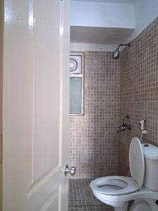 Common Bathroom Image of 1410 Sq.ft 3 BHK Apartment / Flat for sale in Paras Tierea, Sector 137 Noida for Rs. 12600000