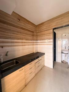 Kitchen Image of 680 Sq.ft 1 BHK Apartment / Flat for sale in Mahaveer River Valley Tower Phase I, Kalyan West Kalyan for Rs. 4350000