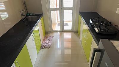 Kitchen Image of 1050 Sq.ft 2 BHK Apartment / Flat for sale in Lodha Belmondo, Gahunje Pune for Rs. 13000000
