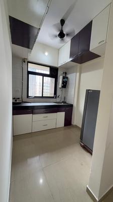 Kitchen Image of 585 Sq.ft 1 BHK Apartment / Flat for sale in Raunak Heights, Kasarvadavali Thane for Rs. 5200000