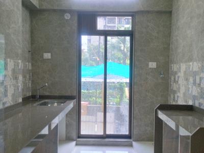 Kitchen Image of 810 Sq.ft 1 BHK Apartment / Flat for sale in Aastha Omkar, Titwala Thane for Rs. 3450000