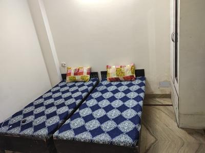 Bedroom Image of Gokuldham pg in Sector 18, Noida