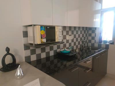 Kitchen Image of 601 Sq.ft 1 BHK Apartment / Flat for sale in Eminence Kimberly Suits, Sector 112 Gurgaon for Rs. 8500000