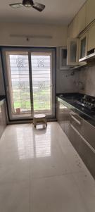Kitchen Image of 800 Sq.ft 2 BHK Apartment / Flat for sale in Arihant Aarohi, Shilphata Thane for Rs. 7000000