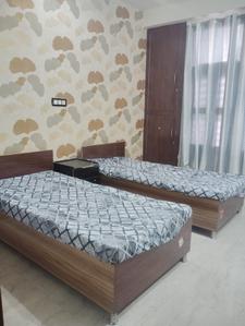 Bedroom Image of Mustang Coliving PG in DLF Phase 5, Gurgaon