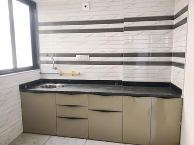 Kitchen Image of 1080 Sq.ft 2 BHK Apartment / Flat for sale in Nakshatra Heights, Narolgam Ahmedabad for Rs. 3250000