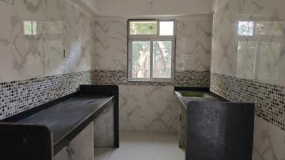 Kitchen Image of 410 Sq.ft 1 BHK Apartment / Flat for sale in DGS Sheetal Tapovan, Malad East Mumbai for Rs. 9000000