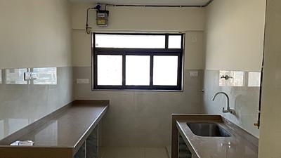Kitchen Image of 1090 Sq.ft 2 BHK Apartment / Flat for sale in Lotus Sky Garden, Malad West Mumbai for Rs. 25700000