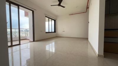 Living Room Image of 1050 Sq.ft 2 BHK Apartment / Flat for rent in Raja Bahadur Pittie Kourtyard D Tower, Kharadi Pune for Rs. 41000