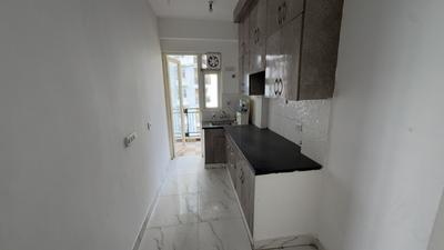 Kitchen Image of 1115 Sq.ft 2 BHK Apartment / Flat for sale in Uppal Casa Woodstock, Noida Extension Greater Noida for Rs. 8850000