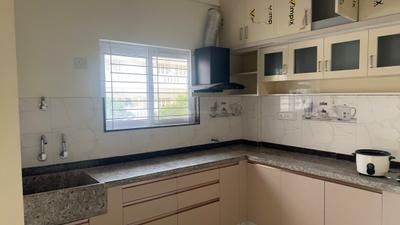 Kitchen Image of 1300 Sq.ft 2 BHK Builder Floor for rent in NRI Layout Bengaluru for Rs. 25000