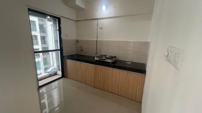 Kitchen Image of 550 Sq.ft 2 BHK Apartment / Flat for sale in Man Opus, Mira Road East Mira Bhayandar for Rs. 7000000