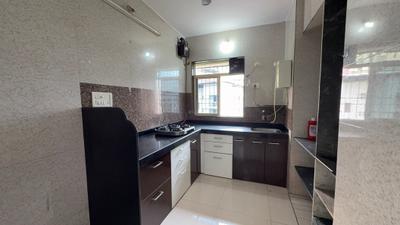 Kitchen Image of 910 Sq.ft 2 BHK Apartment / Flat for rent in Swastik Residency, Hiranandani Estate Thane for Rs. 28000