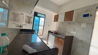 Kitchen Image of 660 Sq.ft 1 BHK Apartment / Flat for sale in Shellproof Gladiolus Tower, Vasai East Vasai for Rs. 4400000
