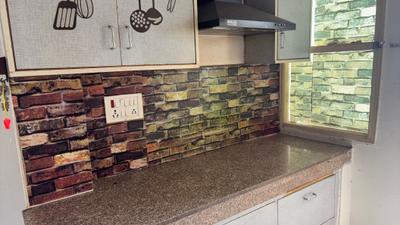 Kitchen Image of 700 Sq.ft 1 BHK Builder Floor for rent in Sector 57 Gurgaon for Rs. 25000