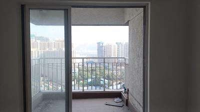 Balcony Image of 915 Sq.ft 1 BHK Apartment / Flat for rent in Lodha Amara, Kolshet Thane for Rs. 45000