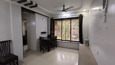 Living Room Image of 580 Sq.ft 1 BHK Apartment / Flat for rent in Kalash Udhyan Complex, Kopar Khairane Navi Mumbai for Rs. 30000