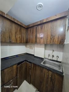 Kitchen Image of 550 Sq.ft 2 BHK Builder Floor for sale in Nawada New Delhi for Rs. 2550000