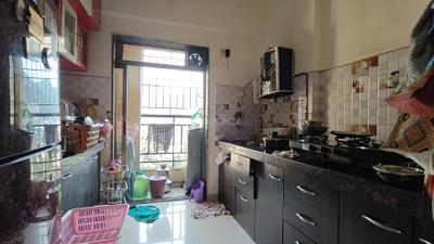 Kitchen Image of 550 Sq.ft 1 BHK Apartment / Flat for rent in Shree Nandanvan Homes Building E, Kalwa Thane for Rs. 25000