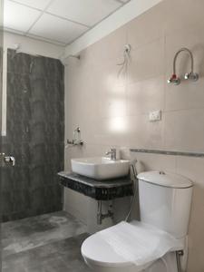 Common Bathroom Image of 1050 Sq.ft 2 BHK Apartment / Flat for sale in Shri Radha Aqua Garden, Noida Extension Greater Noida for Rs. 8800000