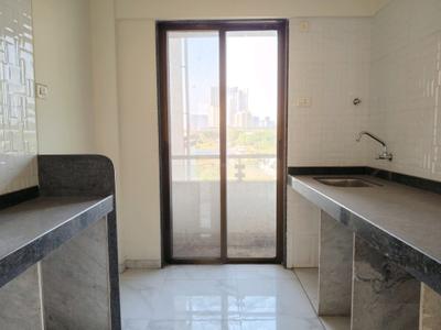 Kitchen Image of 1050 Sq.ft 2 BHK Apartment / Flat for sale in Dharti Aangan, Kharghar Navi Mumbai for Rs. 7500000