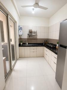 Kitchen Image of 1250 Sq.ft 2 BHK Apartment / Flat for rent in Paranjape Forest Trails Highgardens, Bhugaon Pune for Rs. 30000
