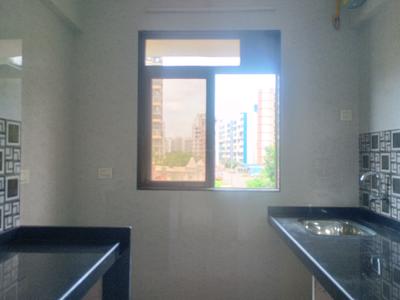 Kitchen Image of 720 Sq.ft 1 BHK Apartment / Flat for sale in Kalyan East Kalyan for Rs. 4500000
