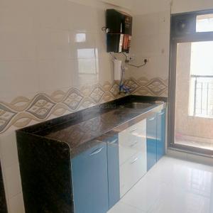 Kitchen Image of 1005 Sq.ft 2 BHK Apartment / Flat for rent in Shilphata Thane for Rs. 18000
