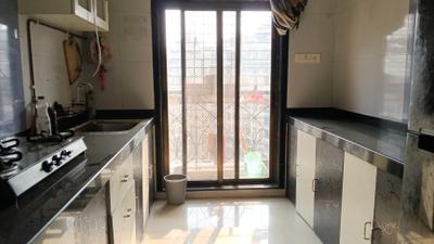 Kitchen Image of 1200 Sq.ft 2 BHK Apartment / Flat for rent in Tharwanis Sky View, Kharghar Navi Mumbai for Rs. 50000