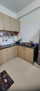 Kitchen Image of 980 Sq.ft 2 BHK Apartment / Flat for sale in Aaryan Gloria, South Bopal Ahmedabad for Rs. 5500000