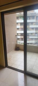 Balcony Image of 678 Sq.ft 1 BHK Apartment / Flat for sale in Kalpataru Estate, Pimple Gurav Pune for Rs. 6300000