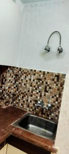 Kitchen Image of 600 Sq.ft 1 BHK Builder Floor for rent in Khirki Extension New Delhi for Rs. 18000