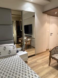 Bedroom Image of 1305 Sq.ft 2 BHK Apartment / Flat for sale in Hiranandani Gardens Valencia, Powai Mumbai for Rs. 40000000