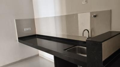 Kitchen Image of 850 Sq.ft 2 BHK Apartment / Flat for rent in Kohinoor Viva City , Dhanori Pune for Rs. 24000