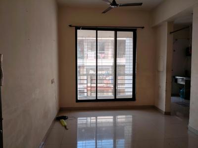 Living Room Image of 785 Sq.ft 1 BHK Apartment / Flat for sale in Arihant Clan Aalishan, Kharghar Navi Mumbai for Rs. 6000000