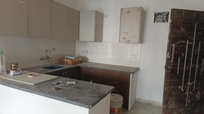 Kitchen Image of 795 Sq.ft 2 BHK Apartment / Flat for rent in Cosmos Cascade Gardens, Sector 99 Gurgaon for Rs. 30000