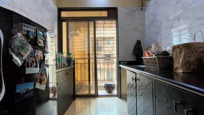 Kitchen Image of 670 Sq.ft 1 BHK Apartment / Flat for sale in Om Prabhu Manohar CHS, Seawoods Navi Mumbai for Rs. 12600000