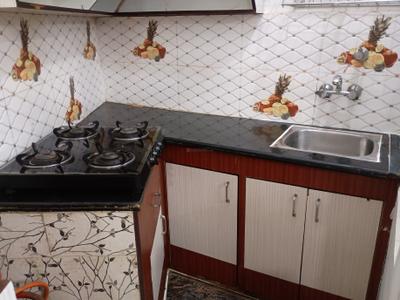 Kitchen Image of 1250 Sq.ft 2 BHK Builder Floor for rent in East Of Kailash New Delhi for Rs. 45000