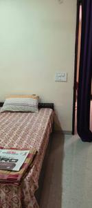 Bedroom Image of FEEL HOME PG in Nawada, New Delhi